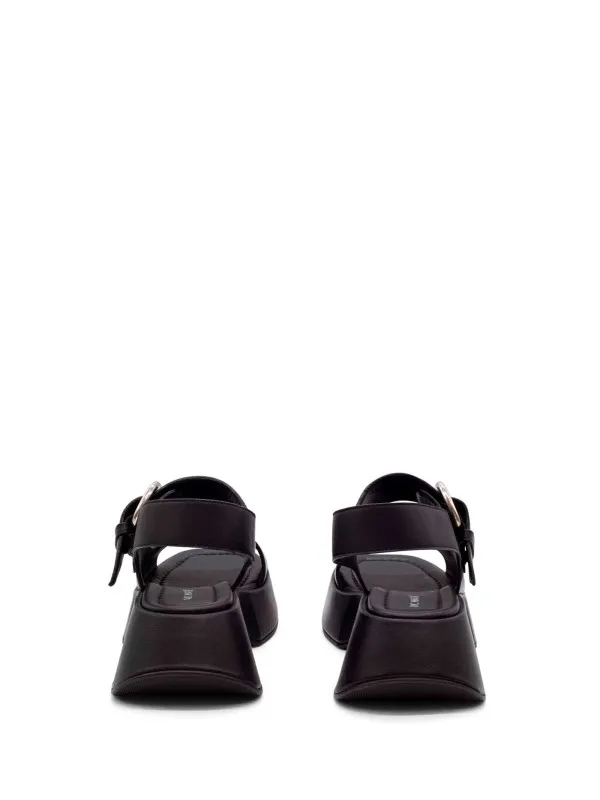 Black leather sandal with maxi buckle